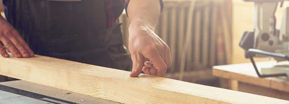 carpenter plaining wood